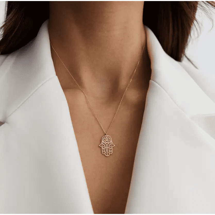 Arabian Hamsa Necklace Designed and handcrafted in the UAE. Delivers within 1 to 4 business days.  This beautiful and heartfelt gold necklace is locally handcrafted with the highest quality materials and artisans available in Dubai. 