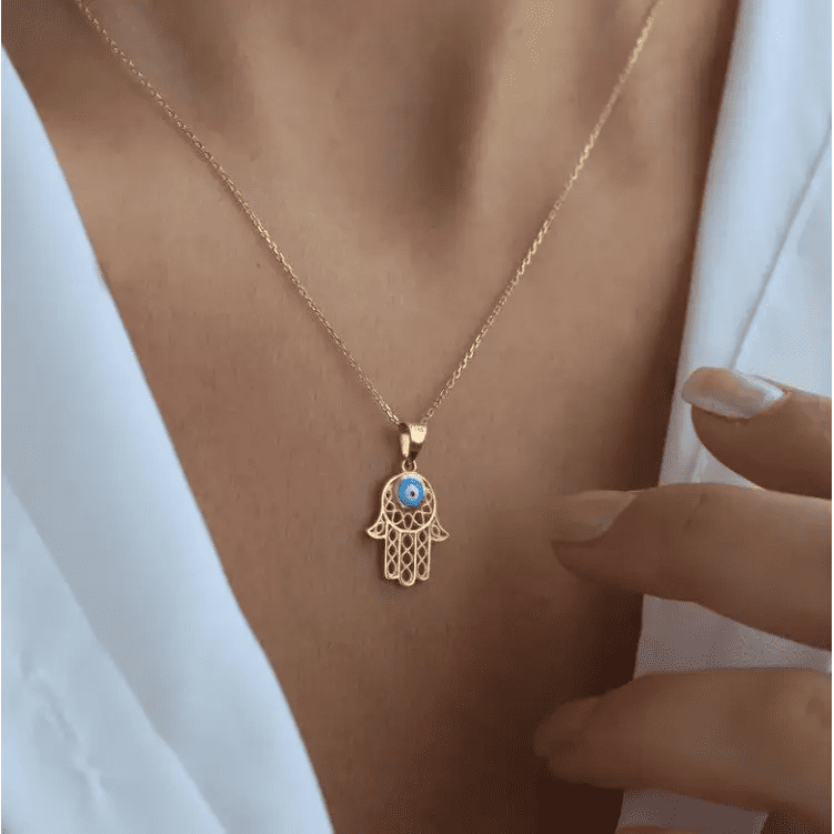 Arabian Hamsa Necklace Designed and handcrafted in the UAE. Delivers within 1 to 4 business days.  This beautiful and heartfelt gold necklace is locally handcrafted with the highest quality materials and artisans available in Dubai. 