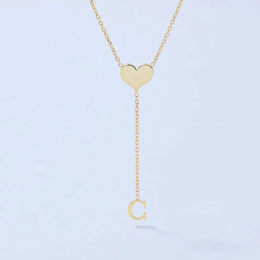 Gold Heart Single Letter Necklace Personalized, designed and handcrafted in the UAE.