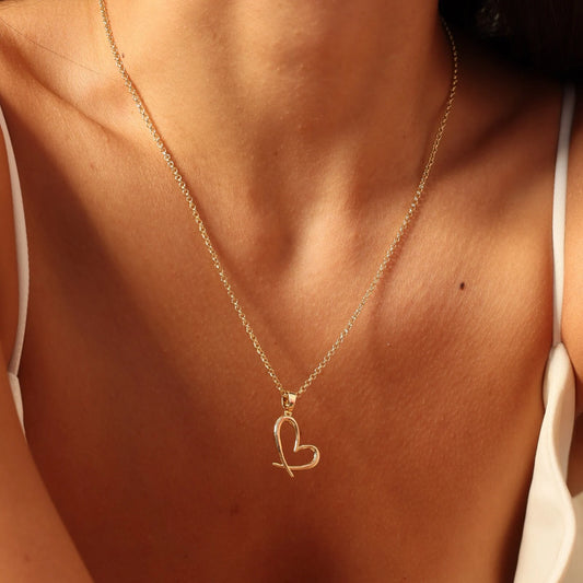18 Carat Gold Heart-Shaped Necklace - A radiant symbol of love inspired by Arabian tales, designed for timeless elegance.