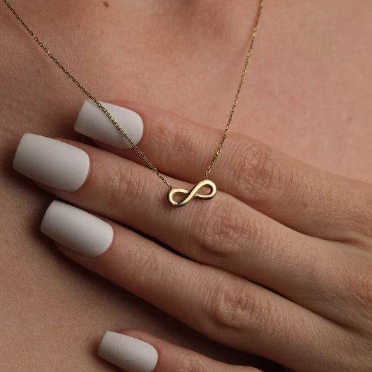 18 Carat Gold Infinity Necklace - A symbol of timeless union, capturing the enduring connections and infinite elegance inspired by Arabian jewelry in the heart of the UAE.