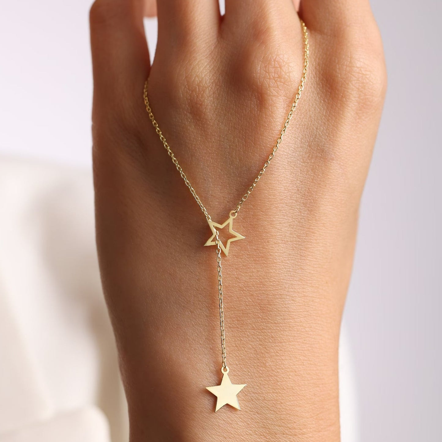 Captivate the night with our 18 Carat Gold Tiny Star Name Necklace - Burst of Arabia. A stellar symphony inspired by the enchanting tales of Arabic constellations