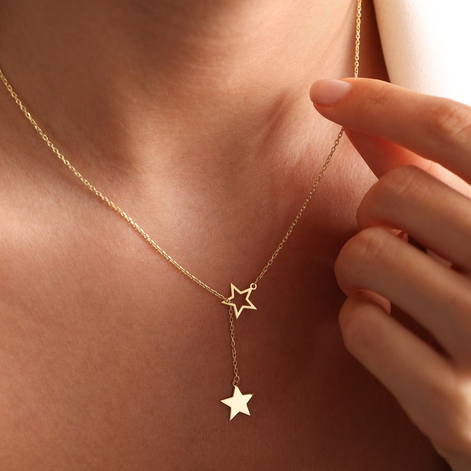 Captivate the night with our 18 Carat Gold Tiny Star Name Necklace - Burst of Arabia. A stellar symphony inspired by the enchanting tales of Arabic constellations