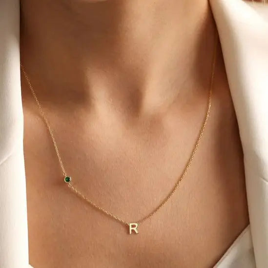 18K Gold initial letter necklace - made in real solid gold. Great for layering with other necklaces or minimalist wear. Can be personalized in Arabic or English.  Crafted to the highest standards and is made at our jewelry workshop in Dubai at the United Arab Emirates.