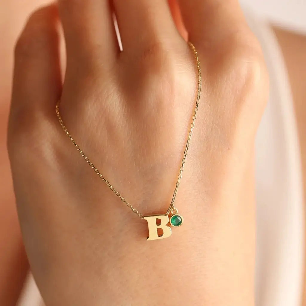 Personalized Initial Birthstone Necklace Designed and handcrafted in the UAE.
