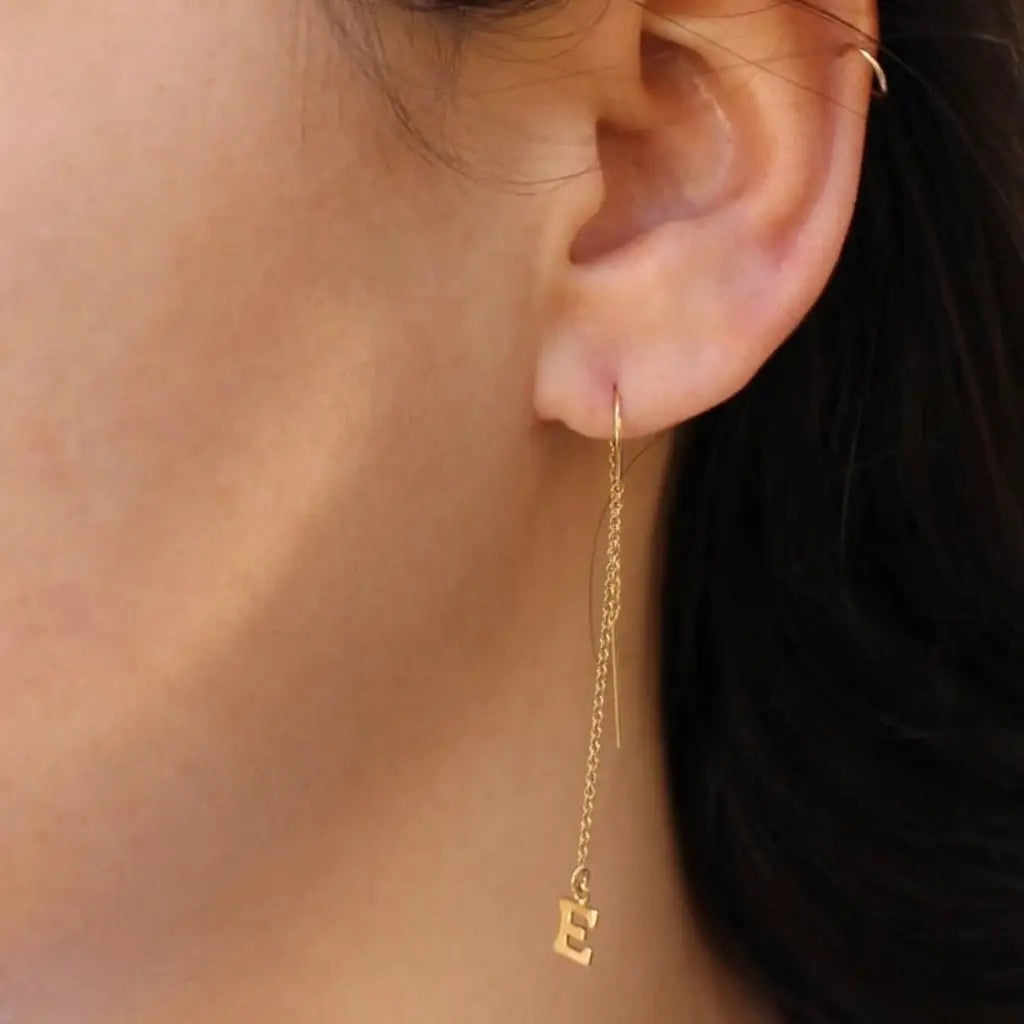This pair of gold initial earrings is locally handcrafted with the highest quality materials and artisans available in Dubai.  Our jewelry is locally handcrafted with the highest quality materials and artisans available in Dubai. 