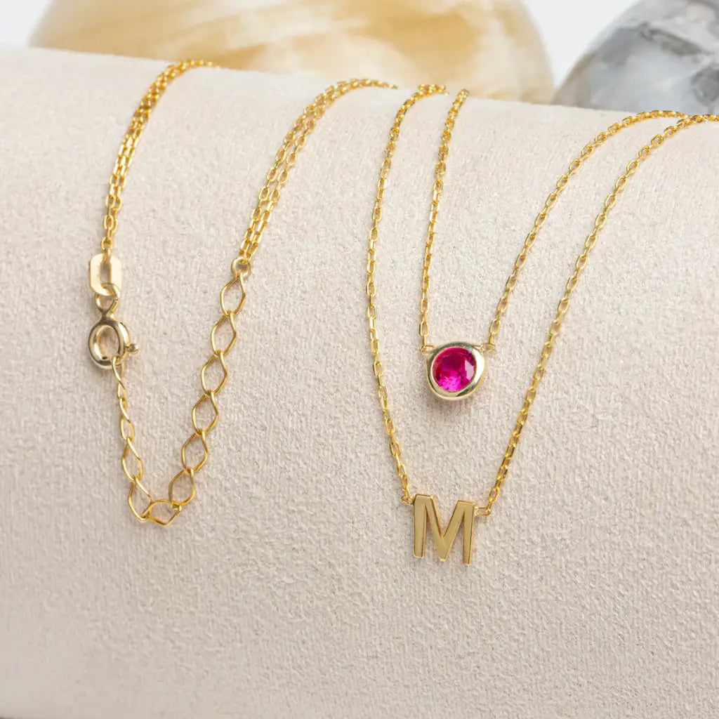 Gold Double Strand Initial Birthstone Necklace - made in real gold. Designed in the United Arab Emirates.