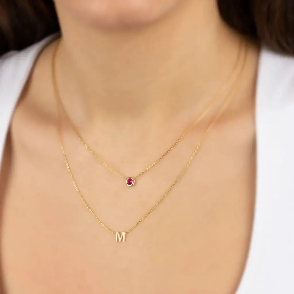 Gold Double Strand Initial Birthstone Necklace - made in real gold. Designed in the United Arab Emirates.