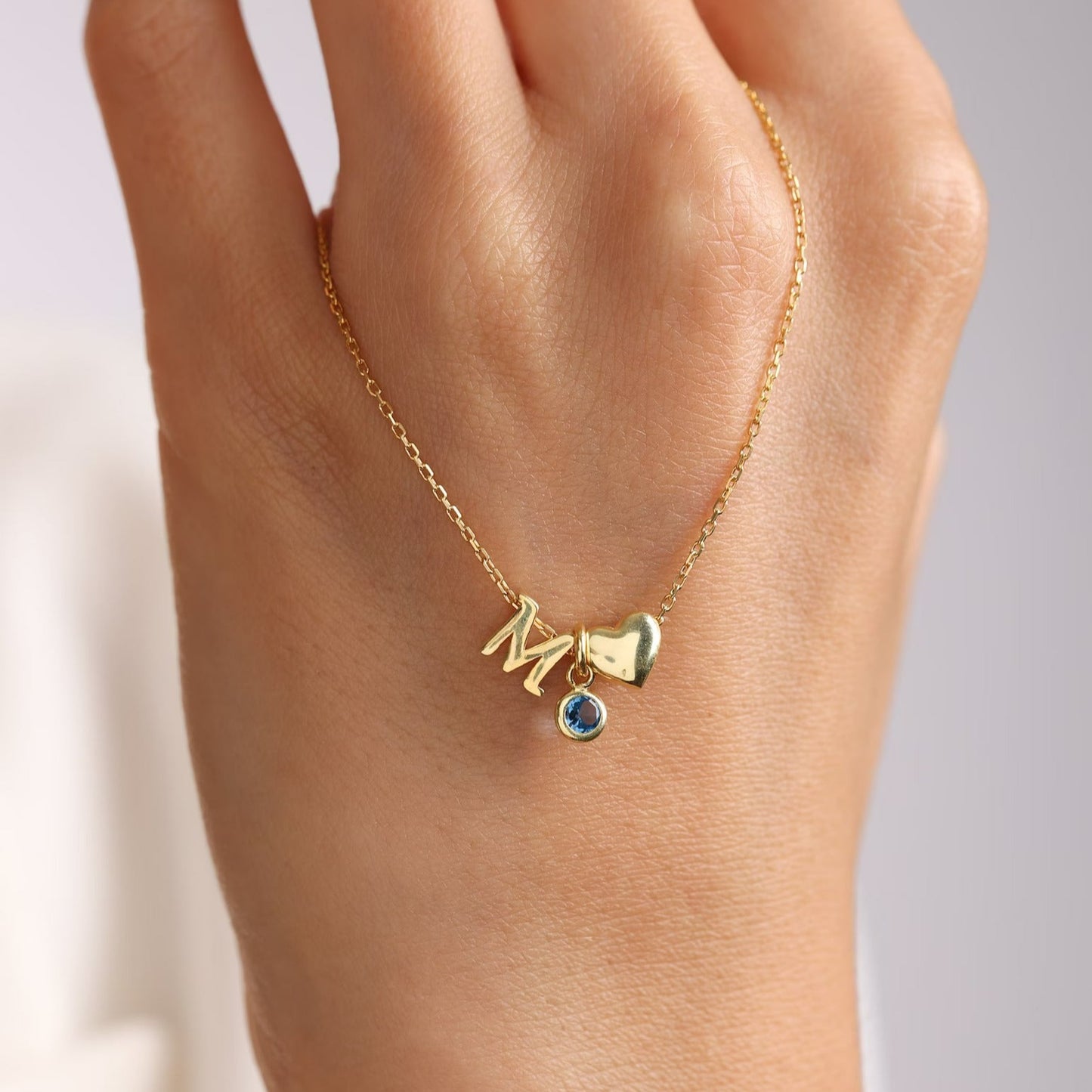 18 carat gold necklace for women - initial, heart and birthstone chain for her. Shop the finest birthday gifts for women in the UAE.