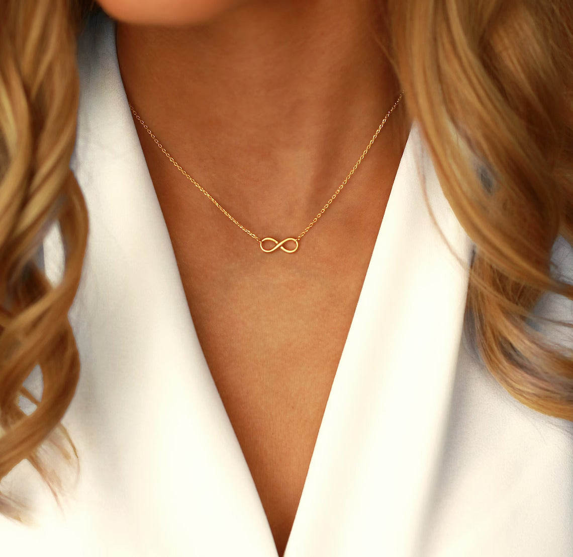 18 Carat Gold Infinity Necklace - A symbol of timeless union, capturing the enduring connections and infinite elegance inspired by Arabian jewelry in the heart of the UAE.