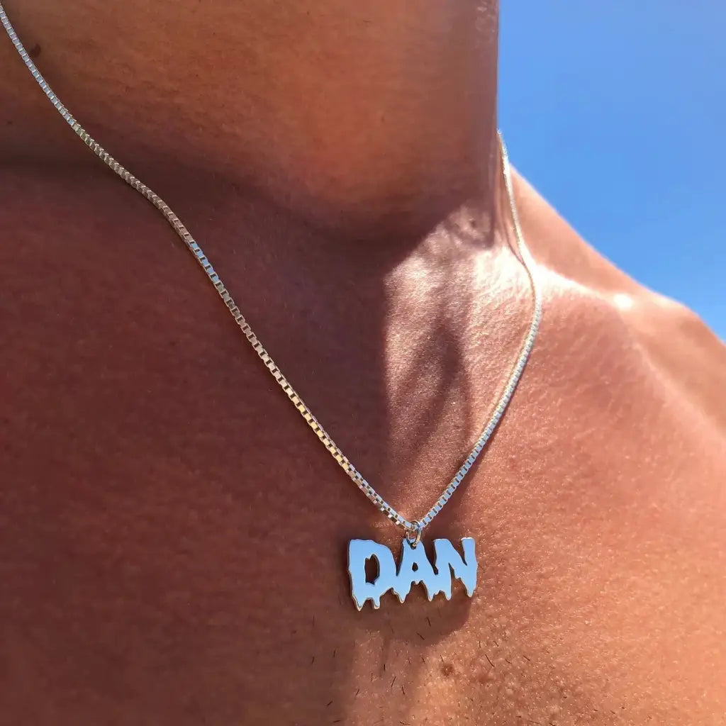 Luxury gold name necklace for him made of genuine 18k solid gold and personalized with the initials/words of your choice. A thoughtful luxury anniversary gift for your boyfriend or husband, and the perfect expensive birthday gift for a father or a brother.