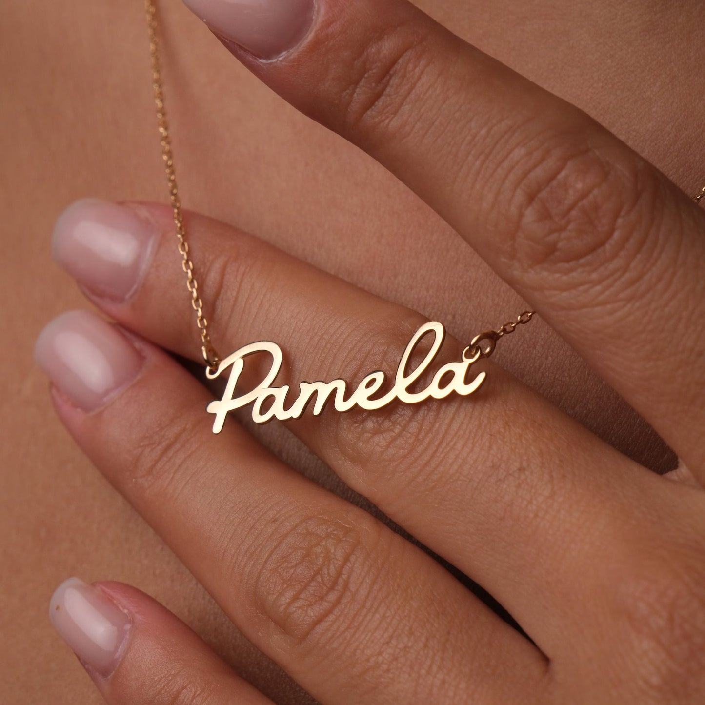 Shop Unique Name Necklaces in the UAE. Find the Perfect Name Necklace for Her. Designed in Gold.