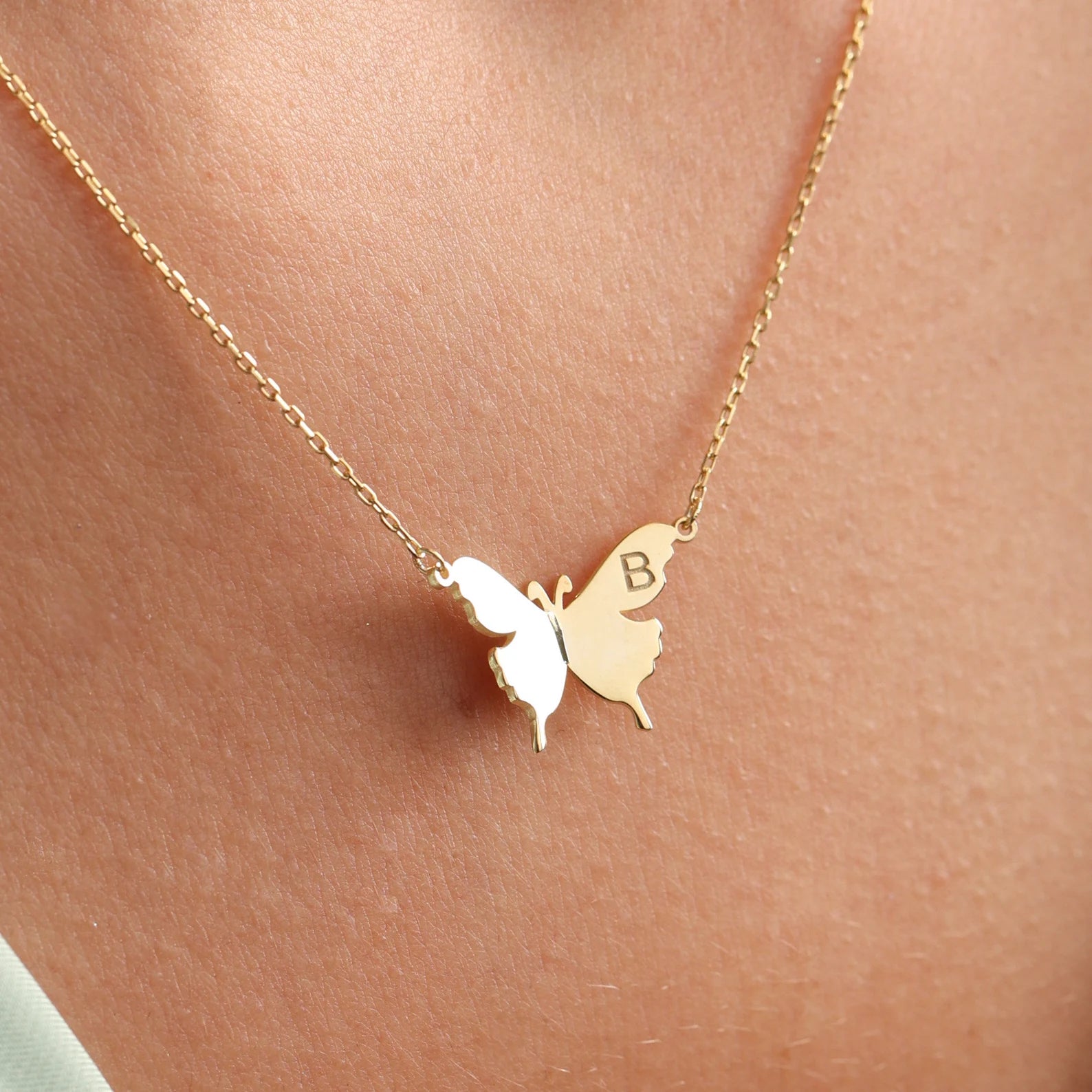 Gold butterfly necklace, handcrafted in Dubai, United Arab Emirates.