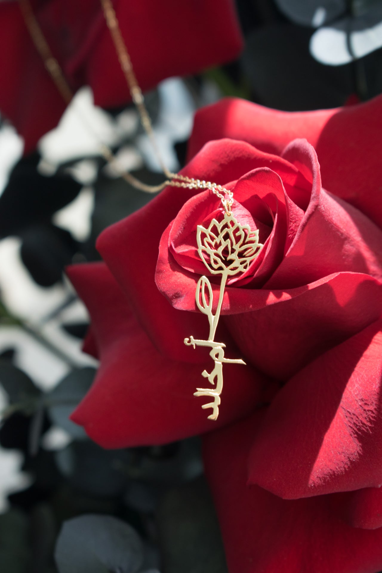 Birth flower name necklace, designed in 18 carat gold in Dubai, UAE