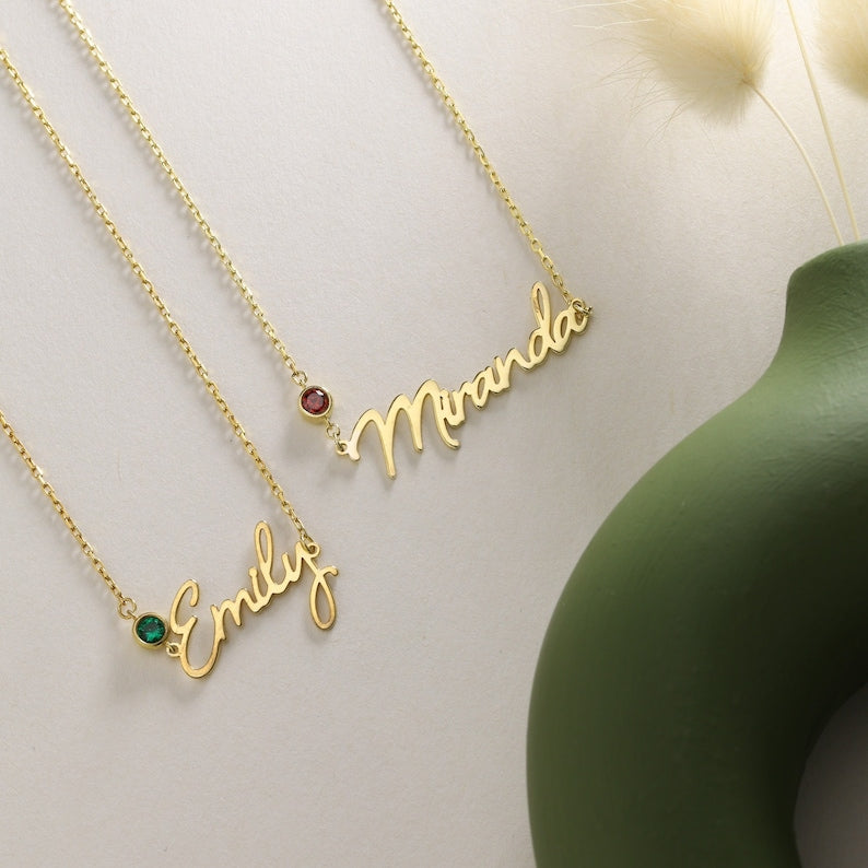 Custom name birthstone necklace in 18K yellow, rose, and white gold, handmade in the UAE, with delivery across the UK, USA, Australia, and GCC.