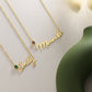 Custom name birthstone necklace in 18K yellow, rose, and white gold, handmade in the UAE, with delivery across the UK, USA, Australia, and GCC.