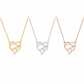 Three heart-shaped interlocking necklaces shown on a white background, in yellow gold, silver, and rose gold finishes.