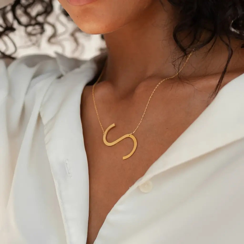 This big letter gold initial necklace is locally handcrafted with the highest quality materials and artisans available in Dubai. Great addition to your collection or perfect gift for a loved one. Made in real gold.