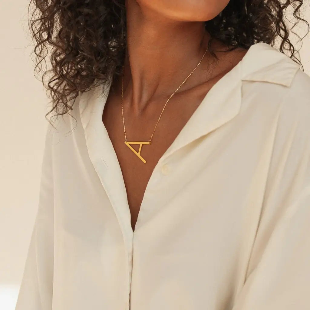 This big letter gold initial necklace is locally handcrafted with the highest quality materials and artisans available in Dubai. Great addition to your collection or perfect gift for a loved one.