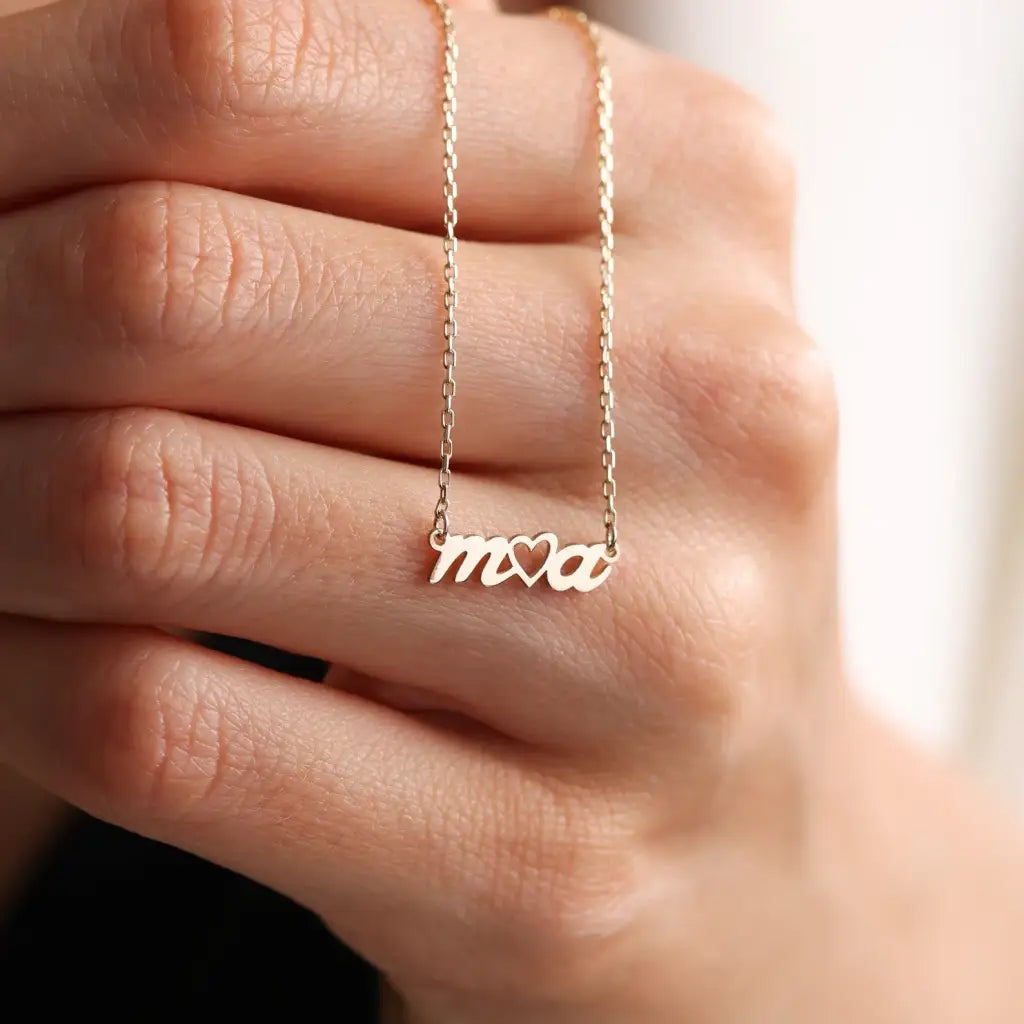 Gold Two Letters Heart Necklace Personalized, designed and handcrafted in the UAE.