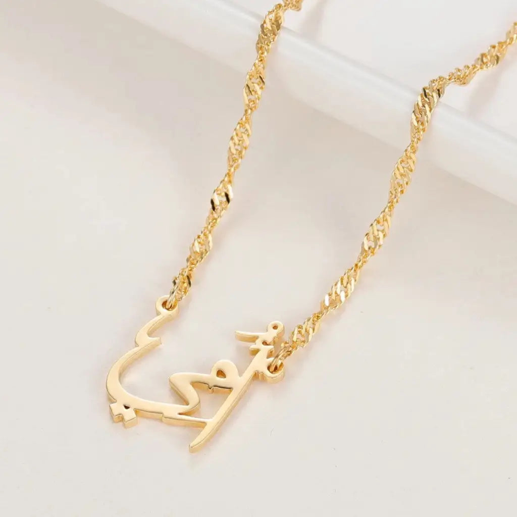 Everyone loves their mother, so here is your opportunity to show her how much you love her. This beautiful gold pendant with the word "Mother" made of real gold is just what every mother would love to receive. Handcrafted in the United Arab Emirates.