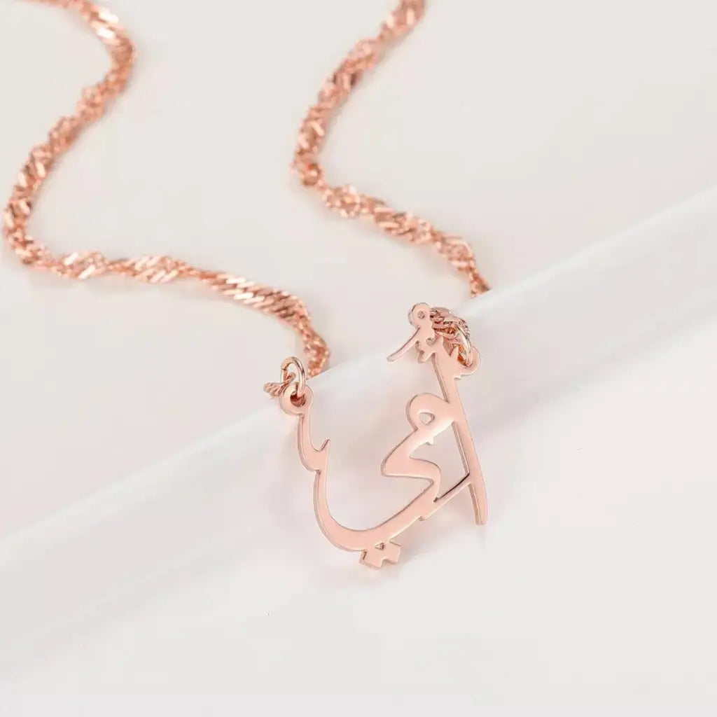 Everyone loves their mother, so here is your opportunity to show her how much you love her. This beautiful gold pendant with the word "Mother" made of real gold is just what every mother would love to receive. Handcrafted in the United Arab Emirates.