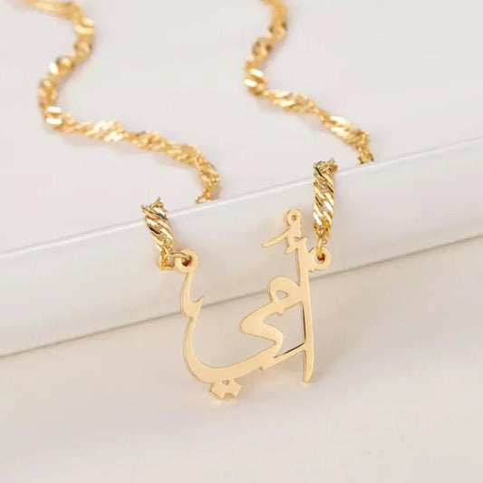 Everyone loves their mother, so here is your opportunity to show her how much you love her. This beautiful gold pendant with the word "Mother" made of real gold is just what every mother would love to receive. Handcrafted in the United Arab Emirates.