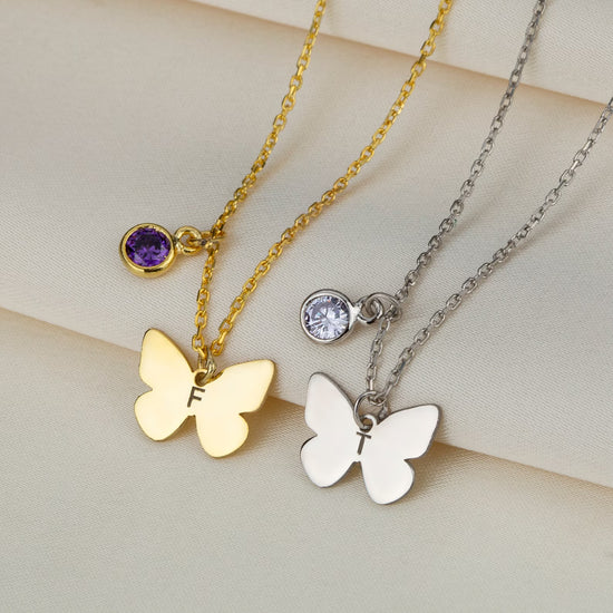 Personalized Gold Butterfly Initial Birthstone Necklace Designed and handcrafted in the UAE.  Pamper your loved one with this exquisite 18 carat gold butterfly initial birthstone necklace, complete with a delicate gold butterfly, birthstone and the initial of your choice.