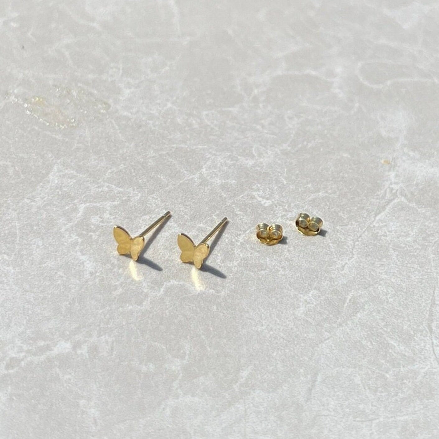 Butterfly stud earrings, in yellow gold