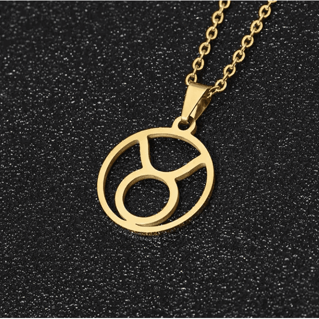 Taurus 18K gold zodiac horoscope necklace for men. A thoughtful luxury anniversary gift for your boyfriend or husband, and the perfect expensive birthday gift for a father or a brother.