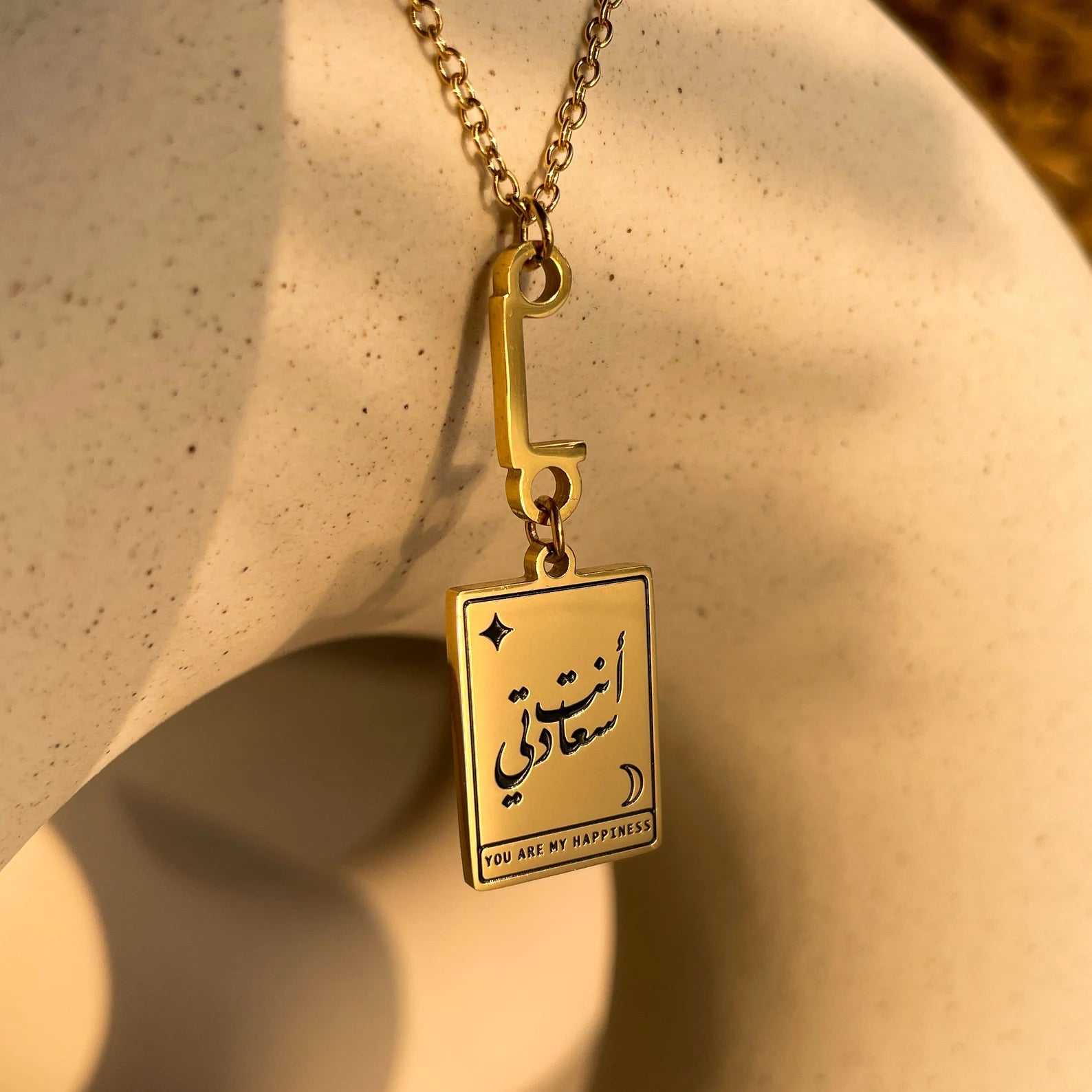 Gold Name Pendant with Initial made in real gold. Designed and handcrafted in the UAE. This unique Gold Name Pendant with Initial is locally handcrafted with the highest quality materials and artisans available in Dubai.