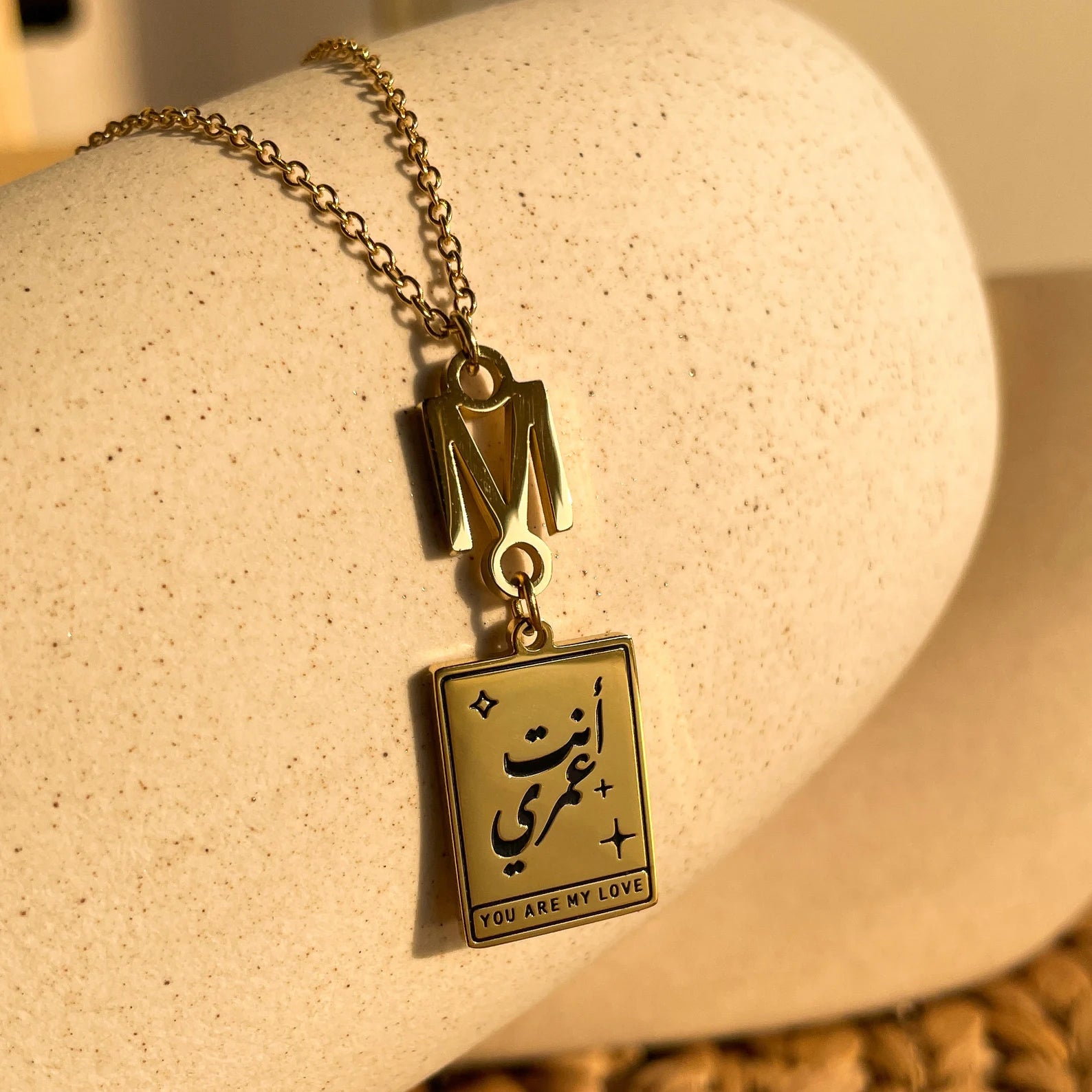 Gold Name Pendant with Initial made in real gold. Designed and handcrafted in the UAE. This unique Gold Name Pendant with Initial is locally handcrafted with the highest quality materials and artisans available in Dubai.